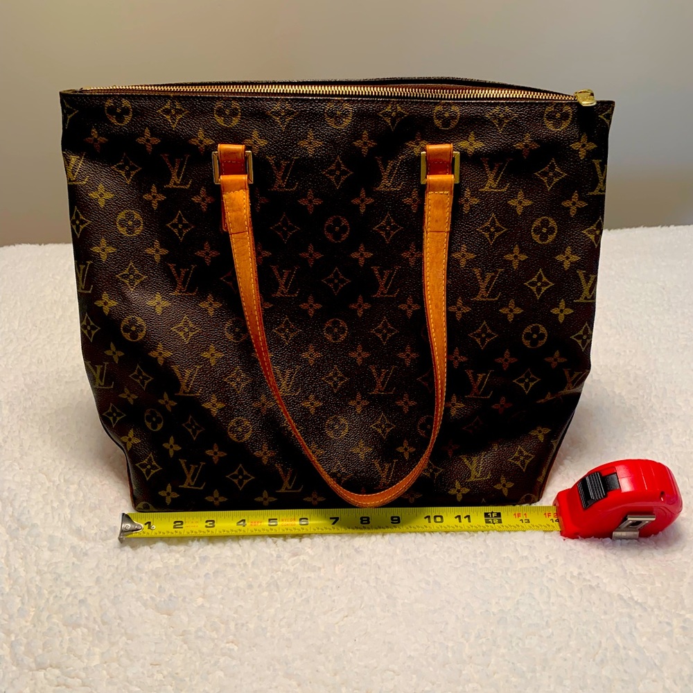 Louis Vuitton bag. Loved condition. Has water marks on the bottom.